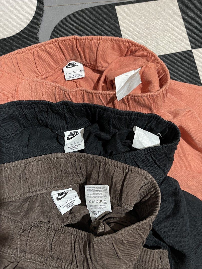 Aspack Nike Shorts Bundle Size S Brown Black Orange (Category: Activewear) located in Las Pinas. Submitted by PrelovedbyYel (Listing ID 1466162328, Image 2). Description: - Set of 3 Nike shorts (Brown, Black, Peach Orange) - Size: S - Material: Comfortable cotton fabric - Features: Elastic waistband with white embroidered swoosh logo - Origin: Made in Vietnam and Cambodia - Best for: Lounging or workouts - Selling as a bundle only.