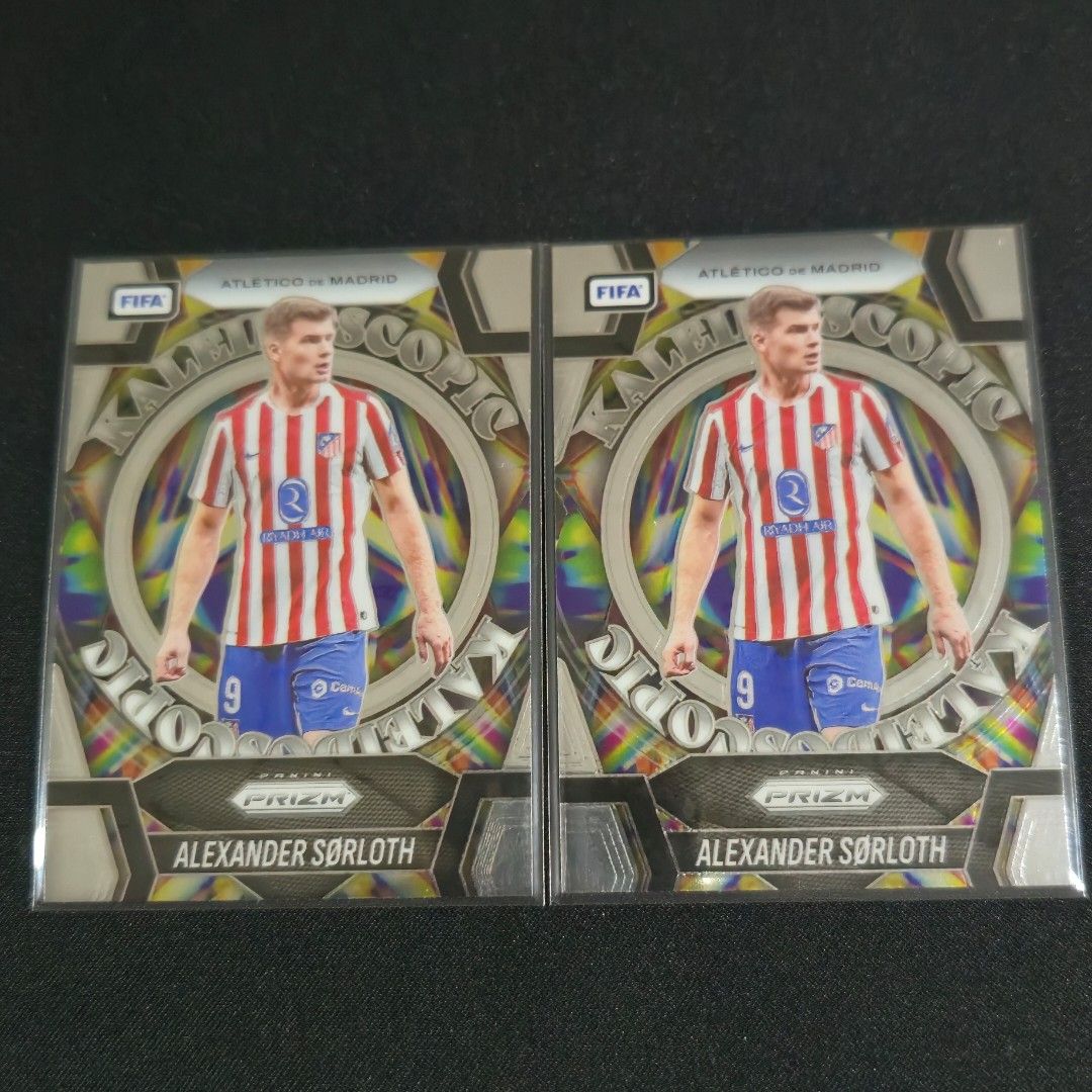 Assorted characters (Category: Raw Cards) located in Singapore. Submitted by thetuascard (Listing ID 1466295961, Image 1). Description: [INSERT] Panini Prizm 2025-2026 FIFA Kaleidoscopic Alexander Sorloth - Atletico Madrid x2 $4 each +$3 for local tracked mailing. Spend above $10 across listings get free mailing.