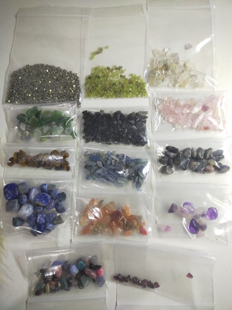 Assorted crystal chip stones in bags (Category: Craft Supplies & Tools) located in Santo Tomas. Submitted by zenzenzennaya (Listing ID 1466289404, Image 1). Description: Bagged gemstone and crystal chips. Includes various types like pyrite, peridot, quartz, and other tumbled stones. Good for crafts, resin art, grids, or crystal collections. Different colors and textures available. Take all only this is genuine crystal chips .