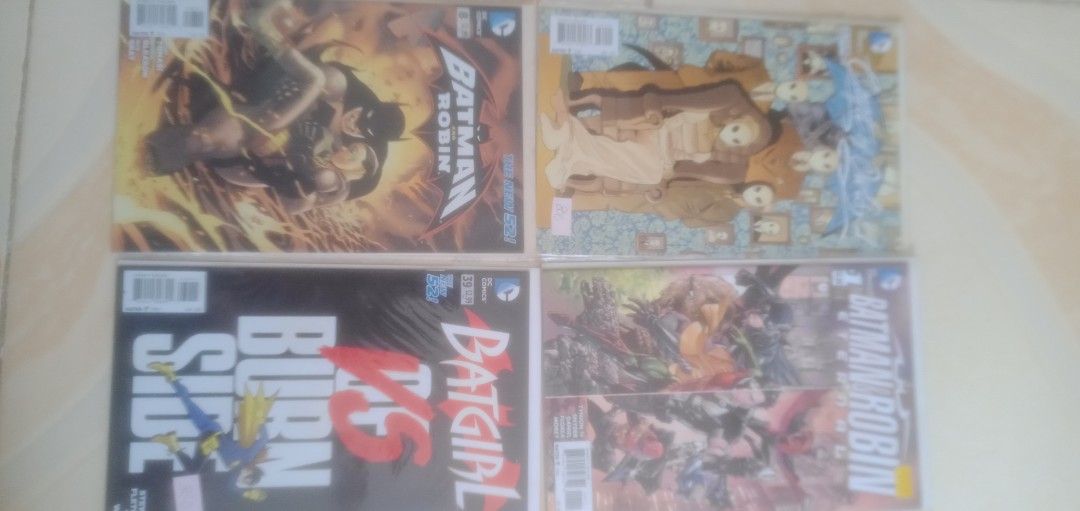 Assorted DC and Marvel Comic Book Bundle (Category: Comics & Manga) located in Caloocan City. Submitted by teamgoodbuys (Listing ID 1466161852, Image 3). Description: - Lot of 32 comic books featuring DC and Marvel - Includes: Nightwing Spotlight, Nightwing #117, Grayson #19, and Star Wars #15 - All comics are bagged and boarded for maximum protection - Perfect bundle for collectors looking to bulk up their stash - Sold as a set only.