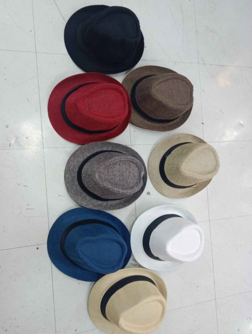 Assorted Fedora Hats Various Colors and Styles (Category: Caps & Hats) located in Manila. Submitted by zdmal (Listing ID 1466166934, Image 1). Description: - Variety of colors: Black, red, brown, grey, tan, blue, and white - Chic contrasting dark ribbon band around the crown - Lightweight and breathable material for all-day comfort - Easy to style for casual days, parties, or outdoor events - Brand new and ready to ship nationwide.