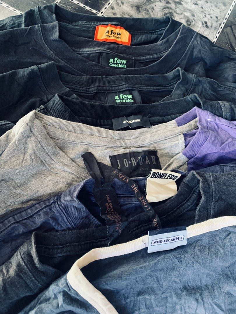 Assorted Graphic and Ringer T-Shirts Various Brands (Category: Tshirts & Polo Shirts ) located in Villasis. Submitted by felixpioli13956 (Listing ID 1466187220, Image 1). Description: Bundle of casual tees featuring various designs like Fishbone ringer, graphic prints, and branded tags. Multiple colours and styles included in the stack. Cotton fabric with normal wear patterns visible across the shirts. Great options for daily casual rotation. Gra