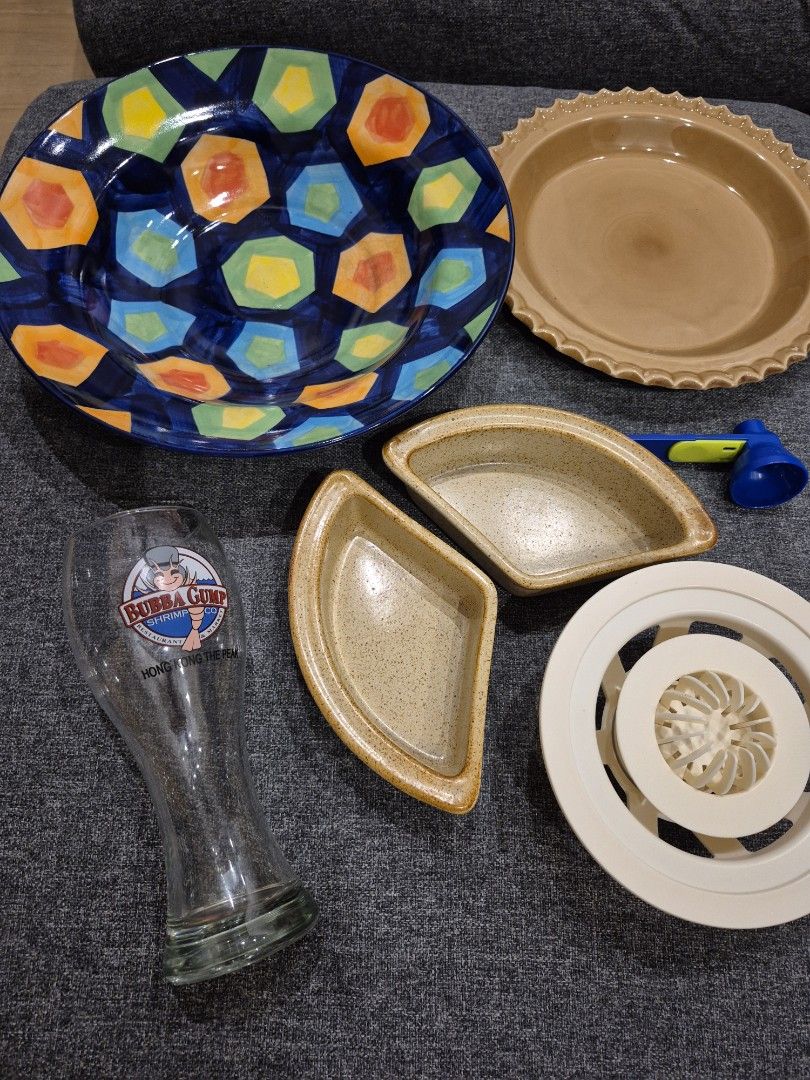 Assorted Kitchenware (Category: Dinnerware & Cutlery) located in Singapore. Submitted by laurita89 (Listing ID 1466234440, Image 1). Description: - Kitchen bundle - Includes: colourful patterned blue bowl, 2 snack dishes (3er one missing), ceramic pie dish, glass pitcher, plastic bao press (tried once, not for me), blue scoop-funnel - Material: Ceramic, glass, and plastic.