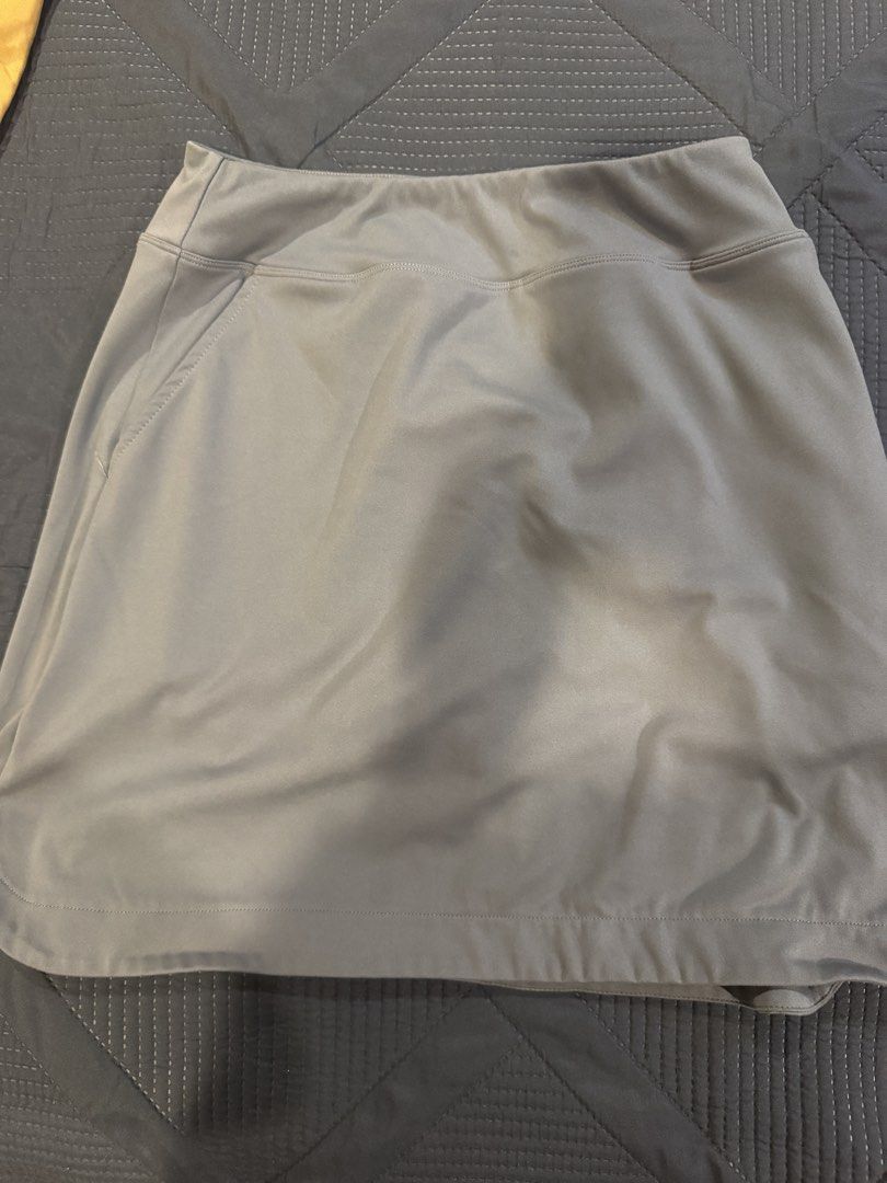 Athletic Skort Grey Size L (Category: Activewear) located in Muntinlupa City. Submitted by myabcshop (Listing ID 1466285244, Image 1). Description: - Size: L (Grey) - Material: Super stretchy & lightweight polyester-elastane blend - Comfort & Coverage: Built-in shorts underneath - Storage: Convenient side pocket - Versatile Use: Great for tennis, golf, gym workouts, or casual days - Condition: Clean and in great shape, no flaws noticed RFS - big 