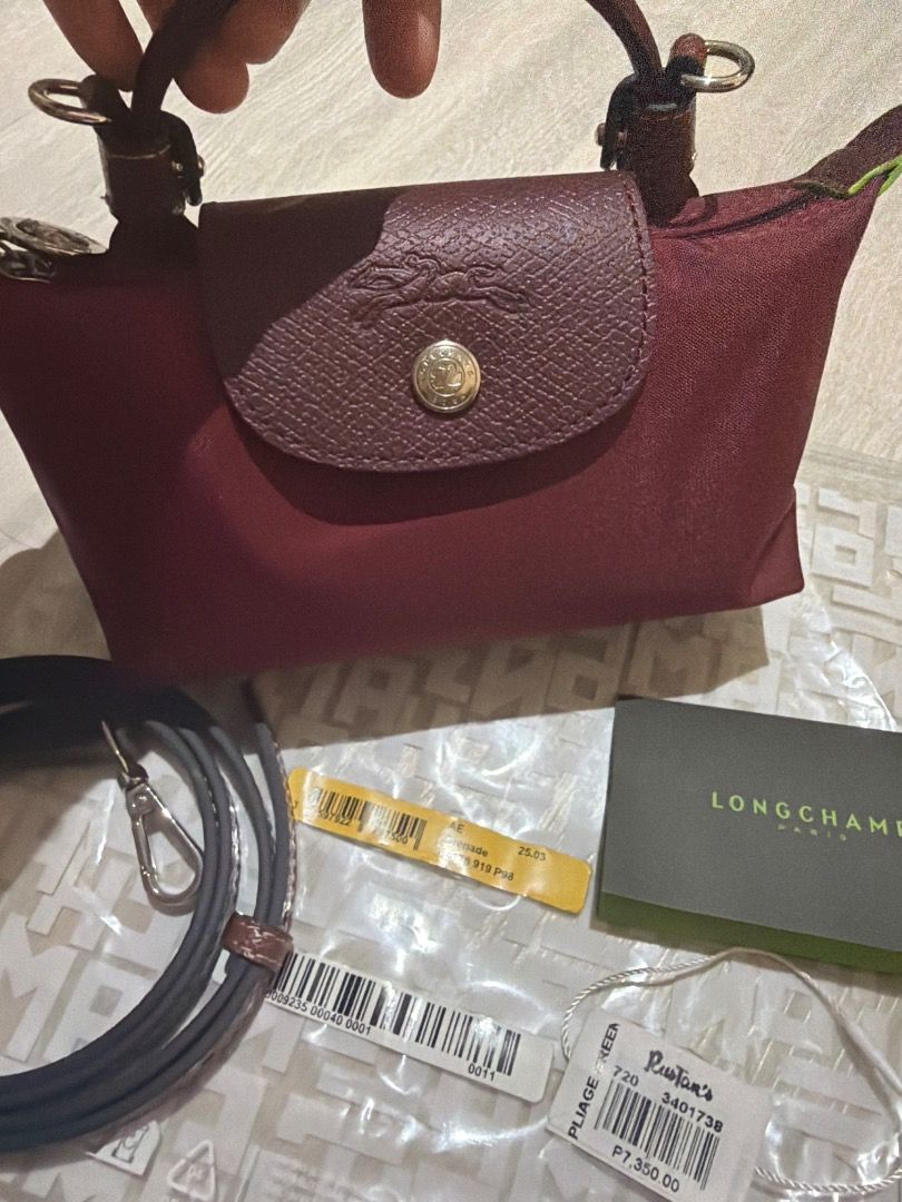 Authentic Brand new Longchamp mini (Category: Cross-body Bags) located in Pasig City. Submitted by smiggie (Listing ID 1466171179, Image 3). Description: Store fresh Brand new with tags Original price 7,350 pesos With free sling strap (generic) .