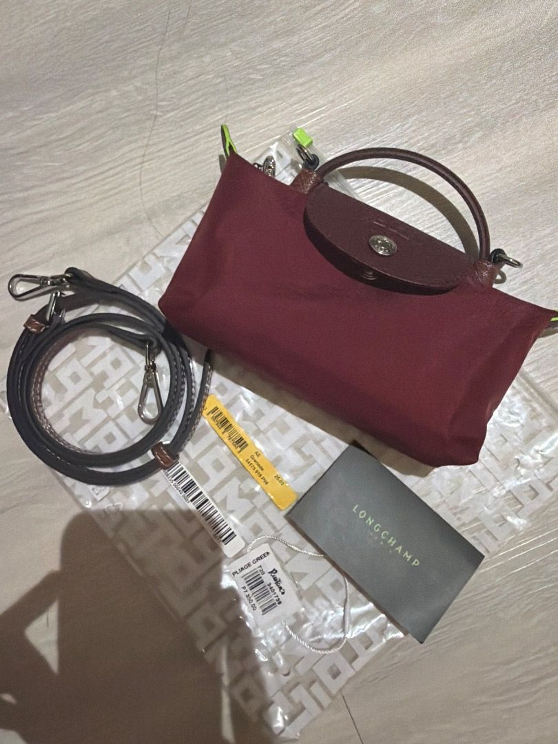Authentic Brand new Longchamp mini (Category: Cross-body Bags) located in Pasig City. Submitted by smiggie (Listing ID 1466171179, Image 2). Description: Store fresh Brand new with tags Original price 7,350 pesos With free sling strap (generic) .