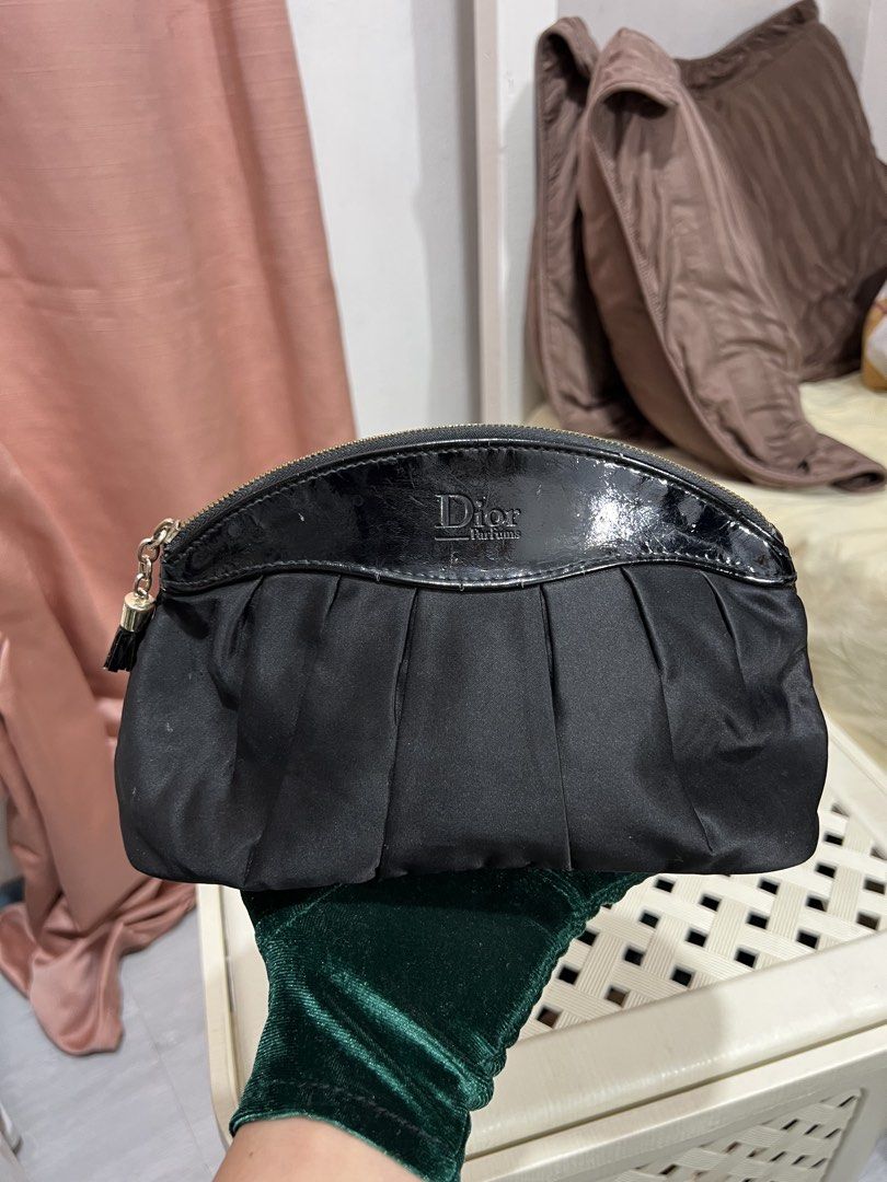 authentic Dior make up pouch (Category: Luxury Bags & Wallets) located in Baguio. Submitted by mercedeshermosamoran (Listing ID 1466218101, Image 1). Description: L- 5 1/2 inches W- 10 inches.