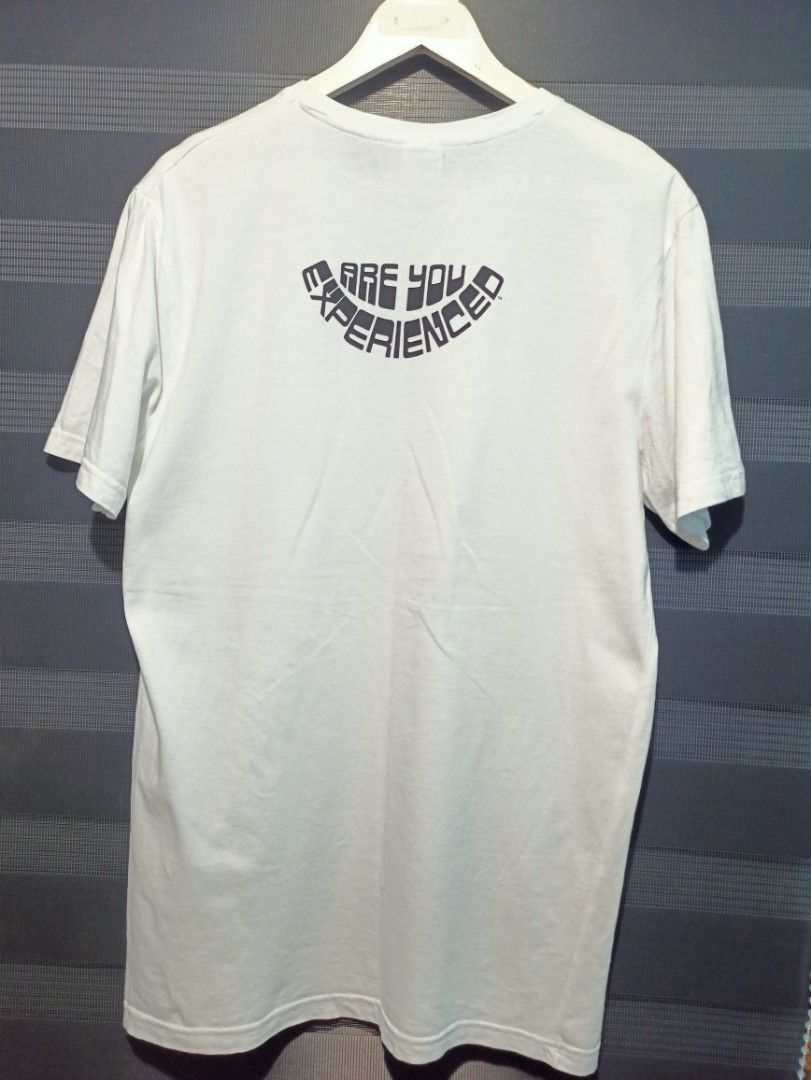 Authentic Hendrix Youre Experienced White T-Shirt Medium (Category: Tshirts & Polo Shirts ) located in Manila. Submitted by thecomftrift.co (Listing ID 1466324577, Image 2). Description: - Item: Authentic Jimi Hendrix graphic tee - Color: White - Size: Medium - Design: B&W guitar photo with signature on front; arched 'Are You Experienced' text on back - Material: Clean cotton - Condition: Excellent, minor storage wrinkles, ready to wear.