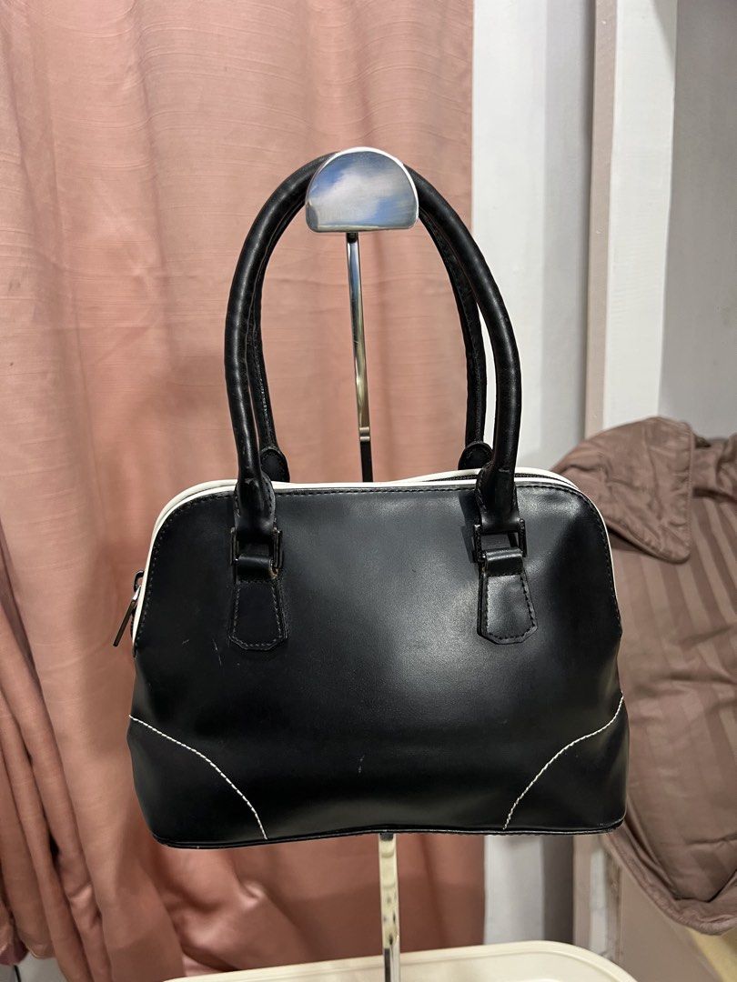 authentic NEXT leatyer top handle bag (Category: Purses & Pouches) located in Baguio. Submitted by mercedeshermosamoran (Listing ID 1466191261, Image 1). Description: L- 6 inches W- 10 inches spacious inside sturdy/ can carry heavy stuff.