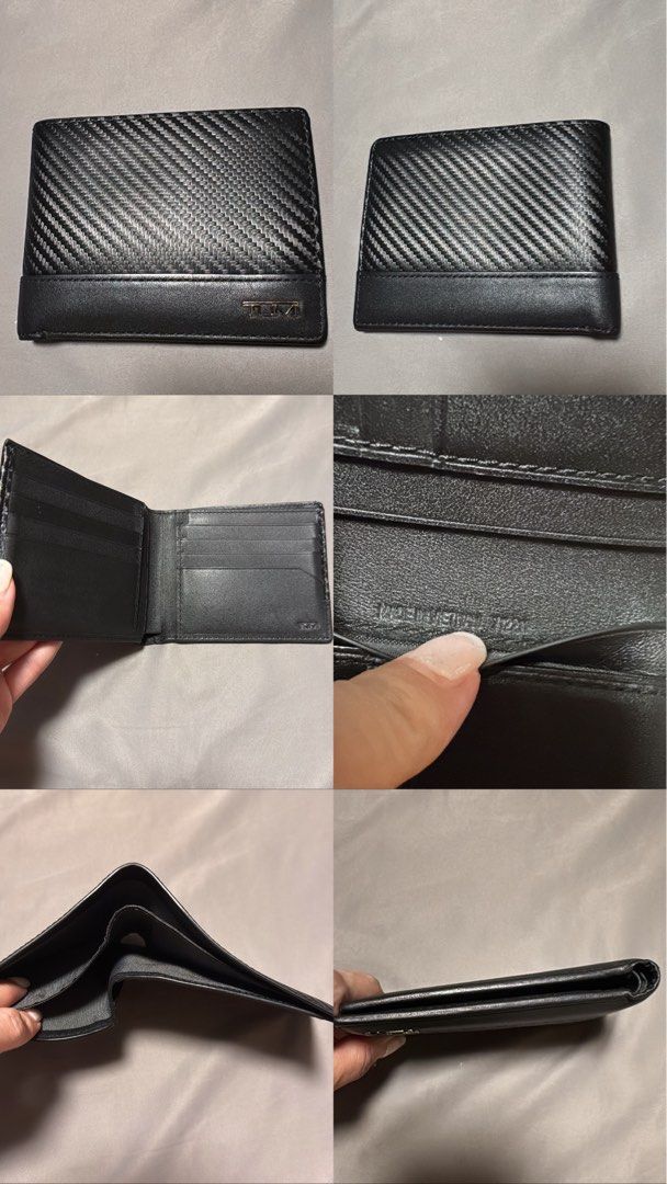 Authentic TUMI Carbon Double Billfold Wallet (Category: Wallets & Card Holders) located in Pasig City. Submitted by jjjj0987 (Listing ID 1466193546, Image 1). Description: A sleek and compact TUMI double billfold wallet featuring a textured carbon-fiber-style exterior with a smooth leather trim and signature TUMI metal logo. Interior has multiple card slots and two separate bill compartments, making it practical while still slim enough for everyd
