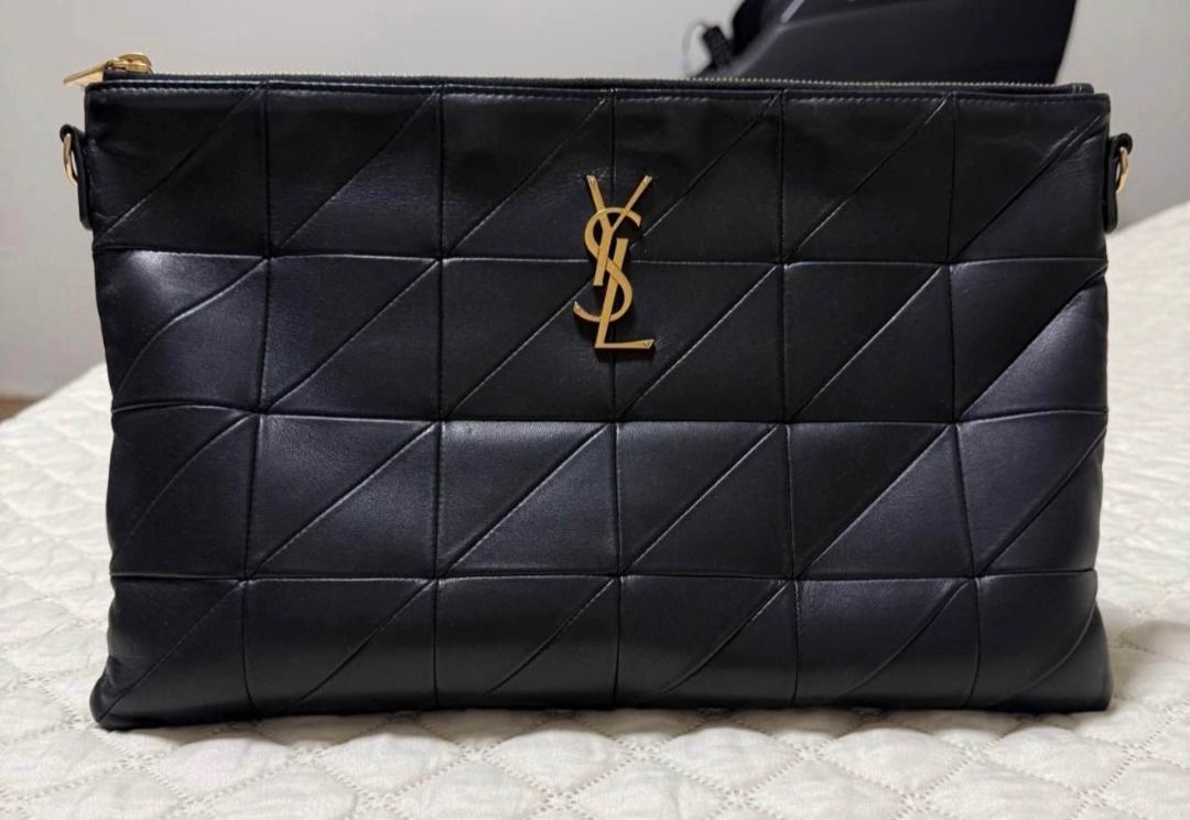 Authentic YSL Jamie Logo Leather Pouch (Category: Luxury Bags & Wallets) located in Quezon City. Submitted by noris_goods (Listing ID 1466243929, Image 2). Description: - With Certificate of Authenticity - Can do meet-ups at Robinsons Magnolia area.
