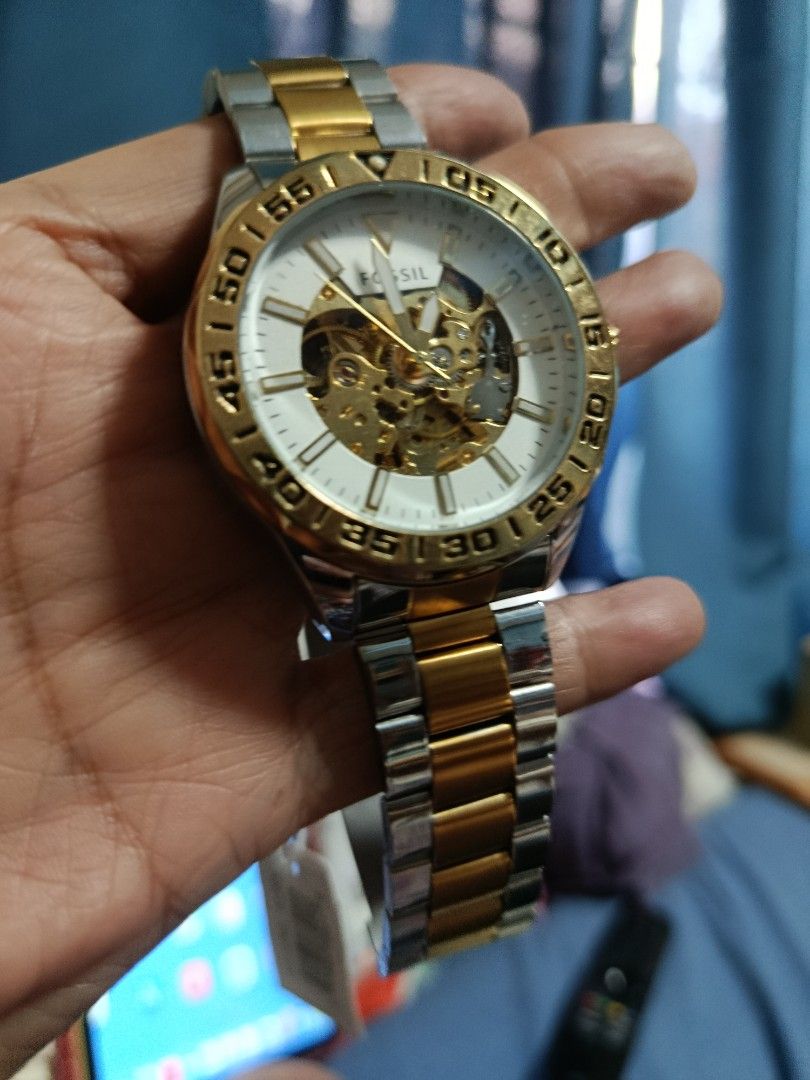 Fossil Heavy Skeletal Automatic gold silver 2 toned watch for men (Category: Men's Watches) located in Quezon City. Submitted by kristal68 (Listing ID 1466192383, Image 3). Description: just rewind it ten times..
