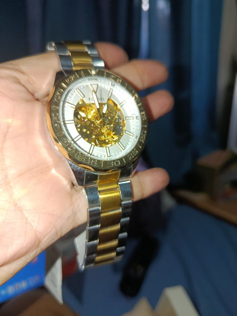 Fossil Heavy Skeletal Automatic gold silver 2 toned watch for men (Category: Men's Watches) located in Quezon City. Submitted by kristal68 (Listing ID 1466192383, Image 2). Description: just rewind it ten times..