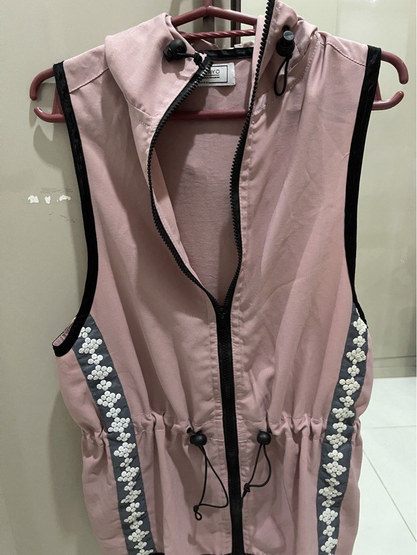 AYO Pink Hooded Vest with Drawstring Waist (Category: Coats, Jackets and Outerwear) located in Manila. Submitted by mariel1124 (Listing ID 1466244513, Image 1). Description: - Brand: AYO - Color: Dusty pink with grey and white floral vertical stripes - Closure: Full front zip with black trim - Fit: Adjustable drawstrings at both the hood and waist - Features: Sleeveless design, perfect for layering, and a small zippered pocket at the lower back -