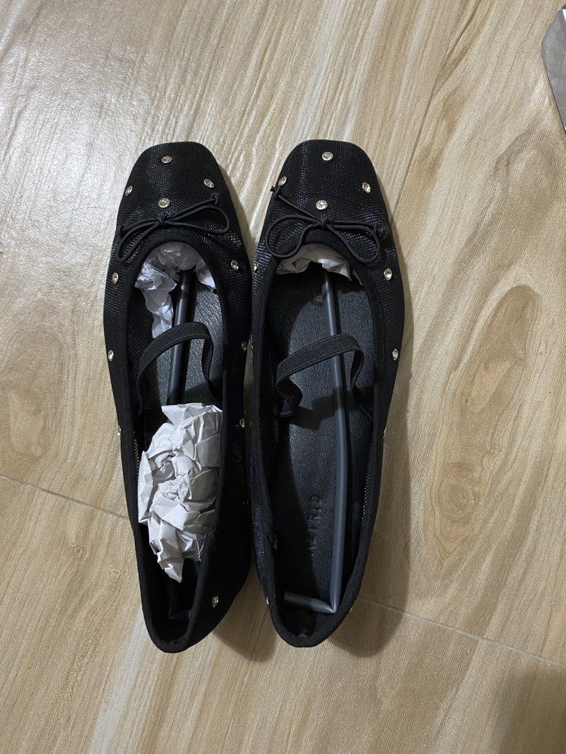 Aztrid Dani Black Mary Jane Flats with Studs and Bow (Category: Flats & Sandals) located in Bacoor. Submitted by anikanikmarket (Listing ID 1466291221, Image 3). Description: - Brand: Aztrid - Style: Black Mary Jane flats with mesh upper - Details: Cute front bow and edgy small metal studs - Fit: Comfortable elastic strap across the topt - Condition: Worn, pristine condition - Packaging: Comes with original branded silver box and paper stuffing.