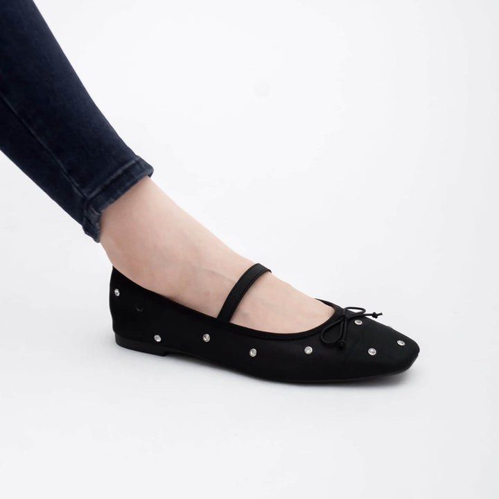 Aztrid Dani Black Mary Jane Flats with Studs and Bow (Category: Flats & Sandals) located in Bacoor. Submitted by anikanikmarket (Listing ID 1466291221, Image 2). Description: - Brand: Aztrid - Style: Black Mary Jane flats with mesh upper - Details: Cute front bow and edgy small metal studs - Fit: Comfortable elastic strap across the topt - Condition: Worn, pristine condition - Packaging: Comes with original branded silver box and paper stuffing.
