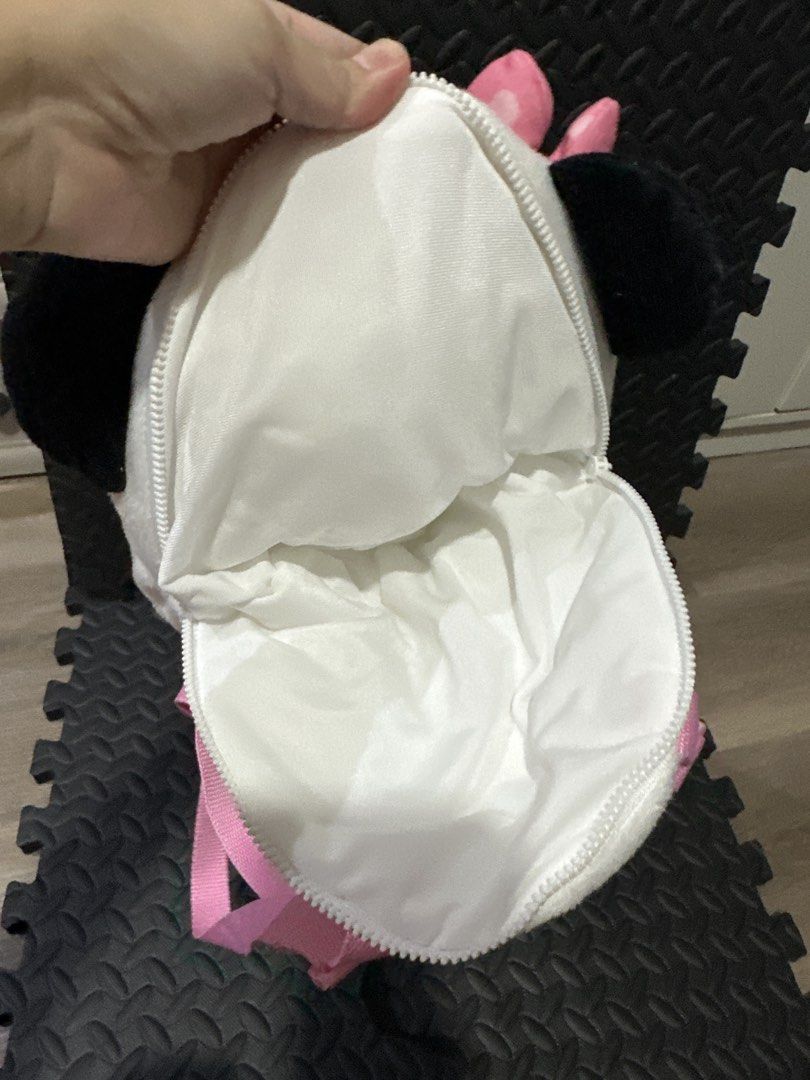 BabyBus Panda Plush Backpack with Pink Bow and Straps (Category: Plushies & Soft Toys) located in Cainta. Submitted by shopbyyna (Listing ID 1466262011, Image 3). Description: - Official BabyBus plush panda backpack - Soft black and white plush body with cute pink bow on the ear - Heart pad details on the paws - Secure zippered inside compartment with white fabric lining - Adjustable pink nylon shoulder straps for a comfortable fit.