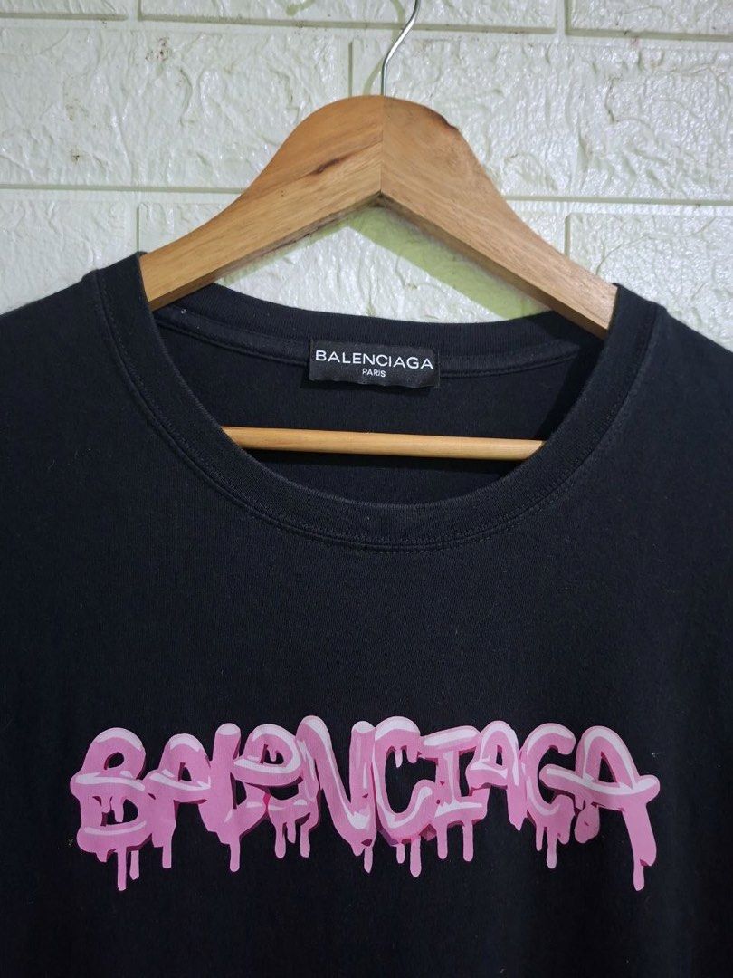 Balenciaga Graffiti Design Shirt (Category: Others Tops) located in Bulacan. Submitted by bleue.finds (Listing ID 1466301053, Image 2). Description: Balenciaga Graffiti Design Shirt 23 - width 27.5 - length no issue as new good condition .