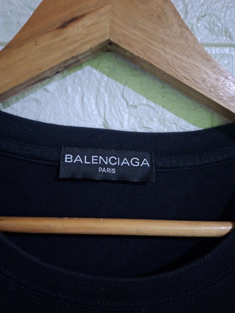 Balenciaga Graffiti Design Shirt (Category: Others Tops) located in Bulacan. Submitted by bleue.finds (Listing ID 1466301053, Image 3). Description: Balenciaga Graffiti Design Shirt 23 - width 27.5 - length no issue as new good condition .