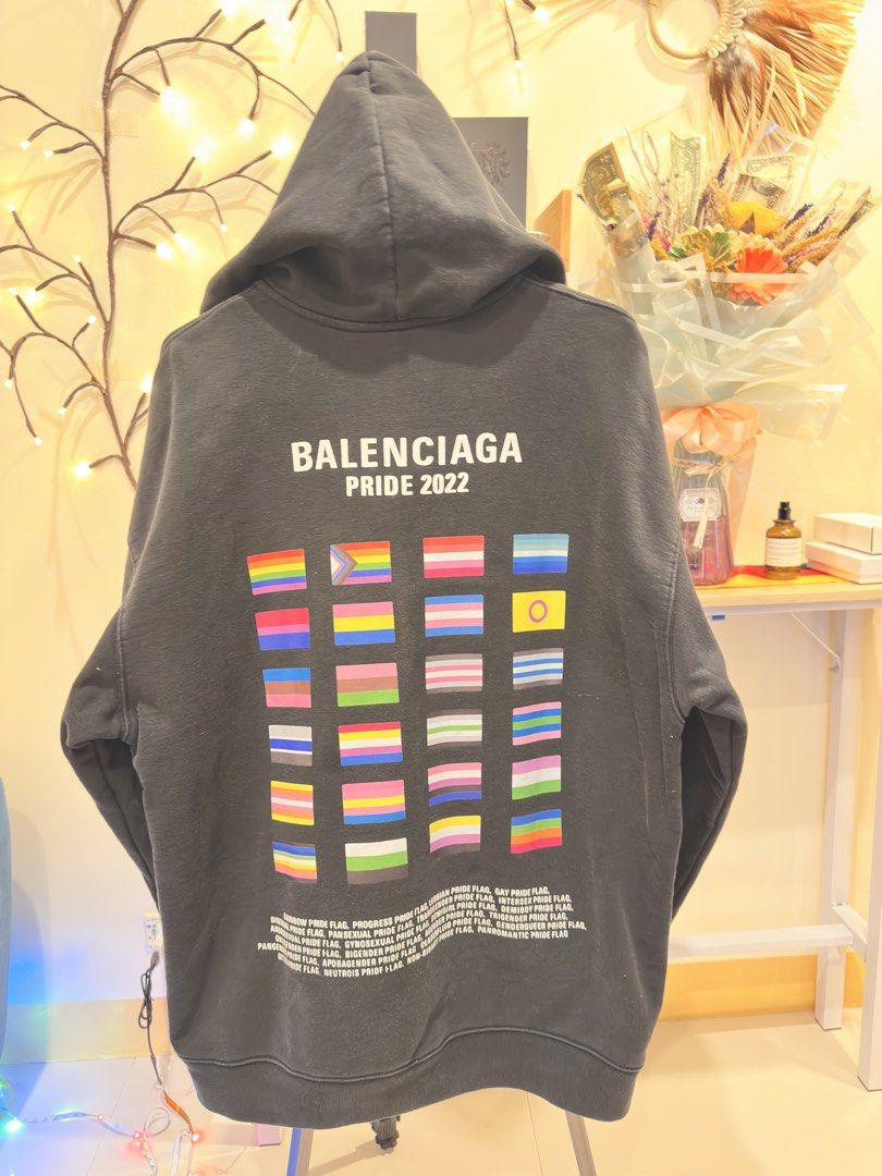 Balenciaga Pride 2022 (Category: Hoodies) located in Malay. Submitted by samkolder (Listing ID 1466243246, Image 1). Description: Dimes: 24 x 29. Sleeve 22 S on tag, fits large or medium close to large. Worn only in my long haul flight. What you see is what you get..