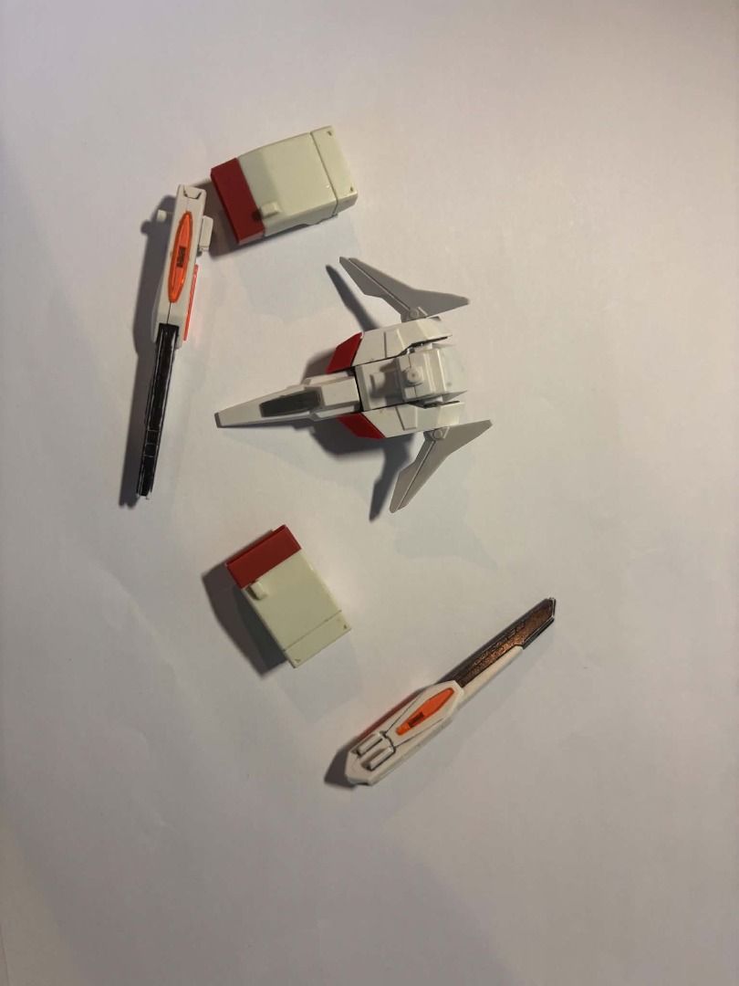 bandai gundam scraps #14 (Category: Gundam & Model Kits) located in Taguig. Submitted by livehorse.8cf1df (Listing ID 1466191614, Image 1). Description: - Gundam model kit loose parts only (no box or manual) - Includes white and red core fighter spacecraft - Comes with 2 weapon attachments and 2 rectangular armor blocks - Great for custom builds, kitbashing, and spare parts replenishment.