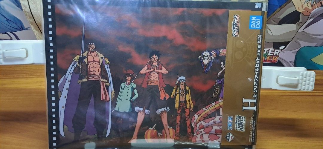 Bandai One Piece Clear File Set (Category: Character Goods) located in Manila. Submitted by mooncollectibles_000a43 (Listing ID 1466328452, Image 2). Description: - Official Bandai One Piece Stampede merchandise - Set includes 2 A4 clear folders with dynamic character art (Luffy, Law, Smoker, Boa Hancock, Sabo) - Stored securely in its original plastic sleeve - Perfect for school, work, or display.