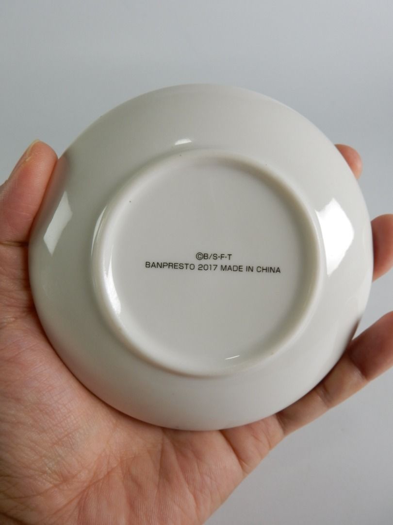 Banpresto Dragon Ball Goku Ceramic Dish 2017 (Category: Dinnerware & Cutlery) located in Bacoor. Submitted by banananana12 (Listing ID 1466264077, Image 3). Description: - Authentic 2017 Banpresto Dragon Ball ceramic dish - Features a stylish black and white Goku action pose - Stamped with official copyright info on the bottom - Versatile small plate ideal for keys, loose change, or small snacks - Pristine, clean surface with zero chips or cracks