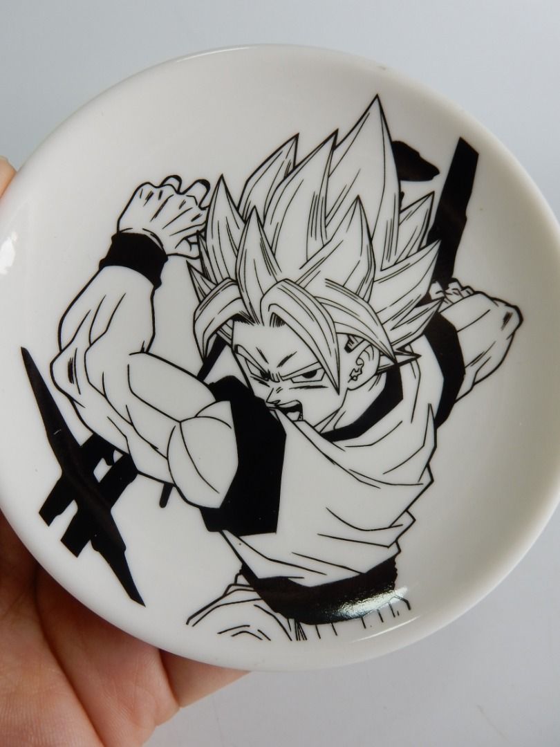 Banpresto Dragon Ball Goku Ceramic Dish 2017 (Category: Dinnerware & Cutlery) located in Bacoor. Submitted by banananana12 (Listing ID 1466264077, Image 2). Description: - Authentic 2017 Banpresto Dragon Ball ceramic dish - Features a stylish black and white Goku action pose - Stamped with official copyright info on the bottom - Versatile small plate ideal for keys, loose change, or small snacks - Pristine, clean surface with zero chips or cracks