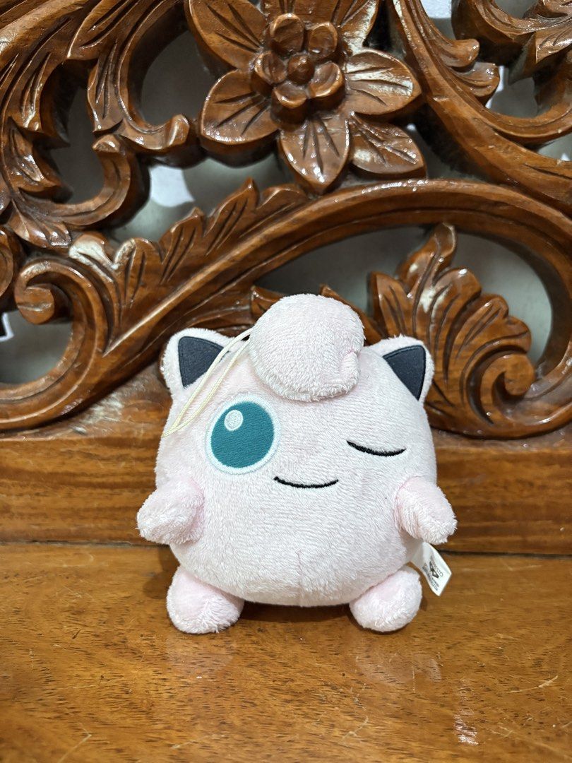 Banpresto Pokémon Jigglypuff Winking Plush Keychain (Category: Plushies & Soft Toys) located in Quezon City. Submitted by rxyel (Listing ID 1466167181, Image 1). Description: - Authentic Banpresto Pokémon Jigglypuff plush toy - Features adorable winking expression and signature hair tuft - Pink soft-textured fabric with stitched smile and black-tipped ears - Includes attached hanging string loop for easy display - Original Banpresto tag attached 