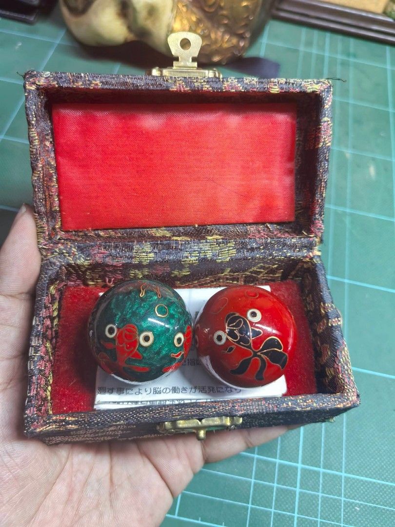 Baoding BALLS - Original (Category: Other Home Decor) located in Cebu City. Submitted by dudes_villanueva (Listing ID 1466292770, Image 1). Description: Baoding BALLS - Original From Japan Auction Good as New 📌 Featuring a sun and moon design, housed in a fabric-covered brocade storage box. 📌 Key Features: • Design: Contrasting red and green spheres decorated with painted celestial motifs. • Function: Hand-held exercise and meditation tools tra