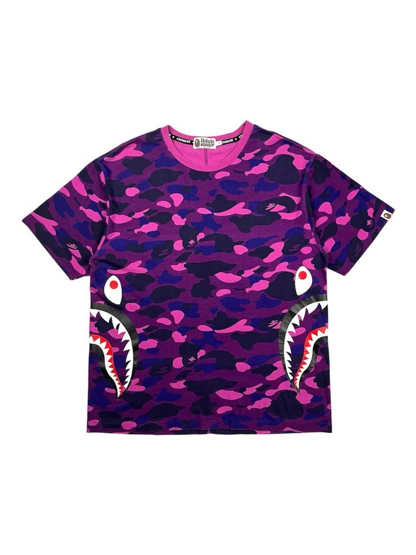 Bape - Shark Purple Camo Tee (Category: Tshirts & Polo Shirts ) located in Puerto Princesa. Submitted by rrugsgallery (Listing ID 1466314814, Image 1). Description: Bape - Shark Purple Camo Tee Tagged Size: Small / best fit large Dimensions Length: 28.5 Width: 22 Condition: Excellent Color rate: 9.8 Flaws: None.