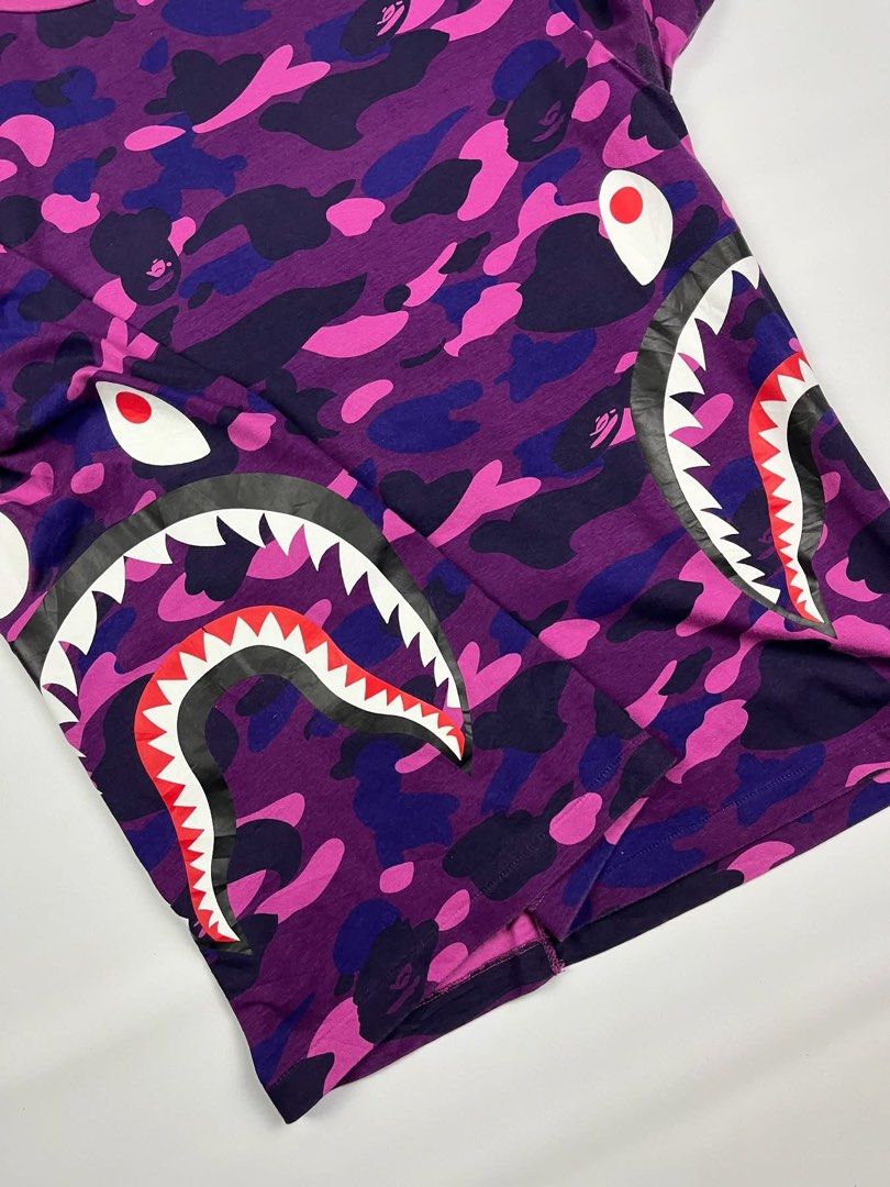 Bape - Shark Purple Camo Tee (Category: Tshirts & Polo Shirts ) located in Puerto Princesa. Submitted by rrugsgallery (Listing ID 1466314814, Image 3). Description: Bape - Shark Purple Camo Tee Tagged Size: Small / best fit large Dimensions Length: 28.5 Width: 22 Condition: Excellent Color rate: 9.8 Flaws: None.
