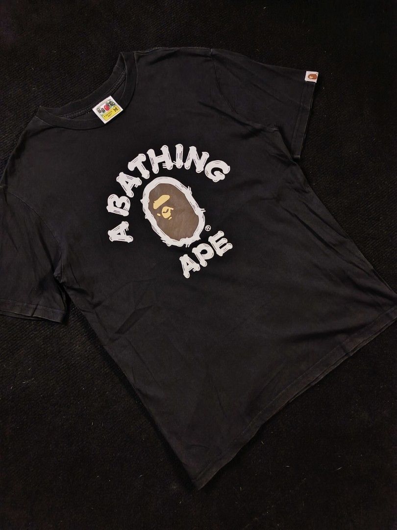 BAPE "A BATHING APE" (Category: Tshirts & Polo Shirts ) located in San Fernando. Submitted by gaboo_asncn (Listing ID 1466321546, Image 1). Description: - BAPE "A BATHING APE" - Size: Medium on tag (W20/L27) - Condition: Excellent - Color Rate: 9.5/10 - No Issue Take note: The shirt is black, and since the carpet/background is also black, the color may look slightly faded or less vibrant in the photos. In actual lighting, the shirt has a normal b