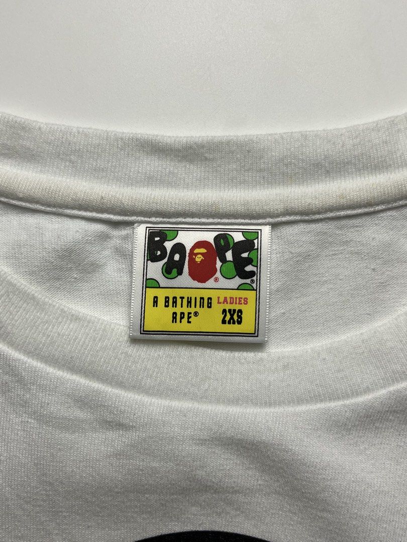 BAPE Baby Milo Tee (Category: Shirts) located in Manila. Submitted by streetsavvy (Listing ID 1466260081, Image 3). Description: BAPE Baby Milo Tee Size: 2XS Width: 16.5” Length: 22.5” Shoulder: 14” Sleeve Length: 6” Hem: 17” Measured in Inches Condition: Excellent condition Flaw: none Made in China 100% Cotton.