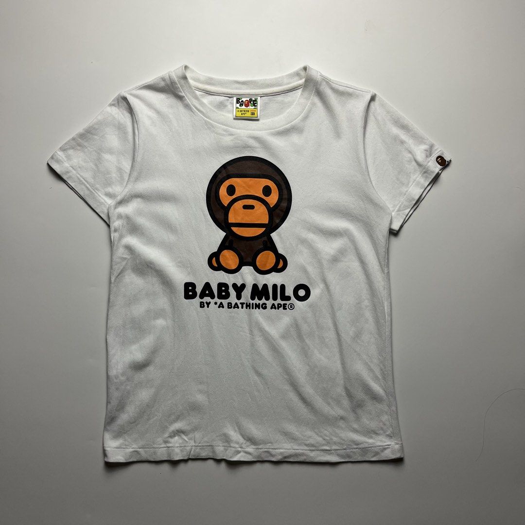 BAPE Baby Milo Tee (Category: Shirts) located in Manila. Submitted by streetsavvy (Listing ID 1466260081, Image 1). Description: BAPE Baby Milo Tee Size: 2XS Width: 16.5” Length: 22.5” Shoulder: 14” Sleeve Length: 6” Hem: 17” Measured in Inches Condition: Excellent condition Flaw: none Made in China 100% Cotton.
