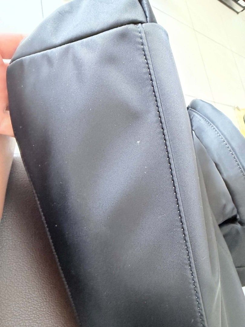 BASH Black Puffer Tote Bag (Category: Tote Bags) located in Caloocan City. Submitted by jennraean (Listing ID 1466235115, Image 3). Description: - Brand: BASH - Color: Classic Black - Material: Soft, lightweight padded puffer - Closure: Secure top zip - Pockets: Front zipper pocket Almost new No flaws All zippers are working No scratches Still With keyleash .