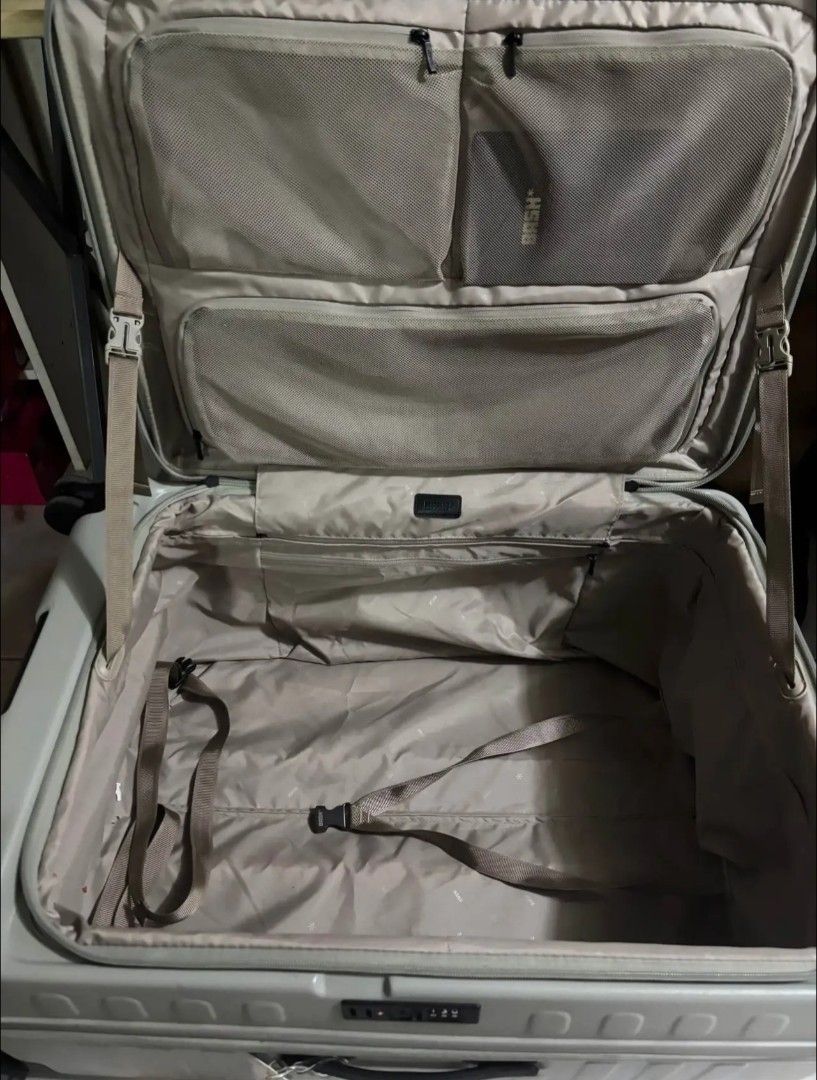 Bash Grey Hard Shell Luggage Suitcase (Category: Luggage) located in Manila. Submitted by ann261 (Listing ID 1466227025, Image 2). Description: - Brand: BASH - Color: Light Grey - Material: Durable hard shell with stylish vertical ribbed design - Mobility: Smooth-rolling wheels with top and side carry handles - Security: Built-in side combination lock - Interior: Multiple zippered mesh compartments, compression straps, and clean fabric lining - C