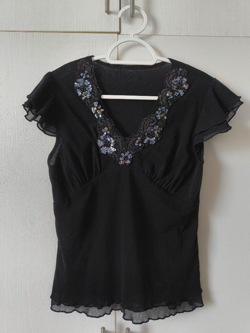 Basic Tops (90s, 2000s, y2k, elevated basics) (Category: Blouses) located in Pasig City. Submitted by gaosorio17 (Listing ID 1466197023, Image 1). Description: First top: - Black v-neck top with cap sleeves - Intact beading around the neckline - Fits XS to M Second top: - White babydoll top - Not see through - Fits S to M Pricing: 1 top: 120 2 tops: 200.