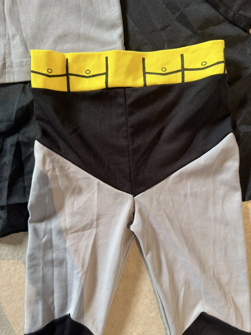 Batman Costume for 2–3yo (Category: Babies & Kids Fashion) located in Las Pinas. Submitted by oliveguns (Listing ID 1466156645, Image 3). Description: - DC Super Heroes Batman costume set - Size: T1 (Toddler) - Long-sleeve grey top with black bat logo with attached black cape - Gartered pants - Issue: pants with obvious stitching on crotch (not seen) .