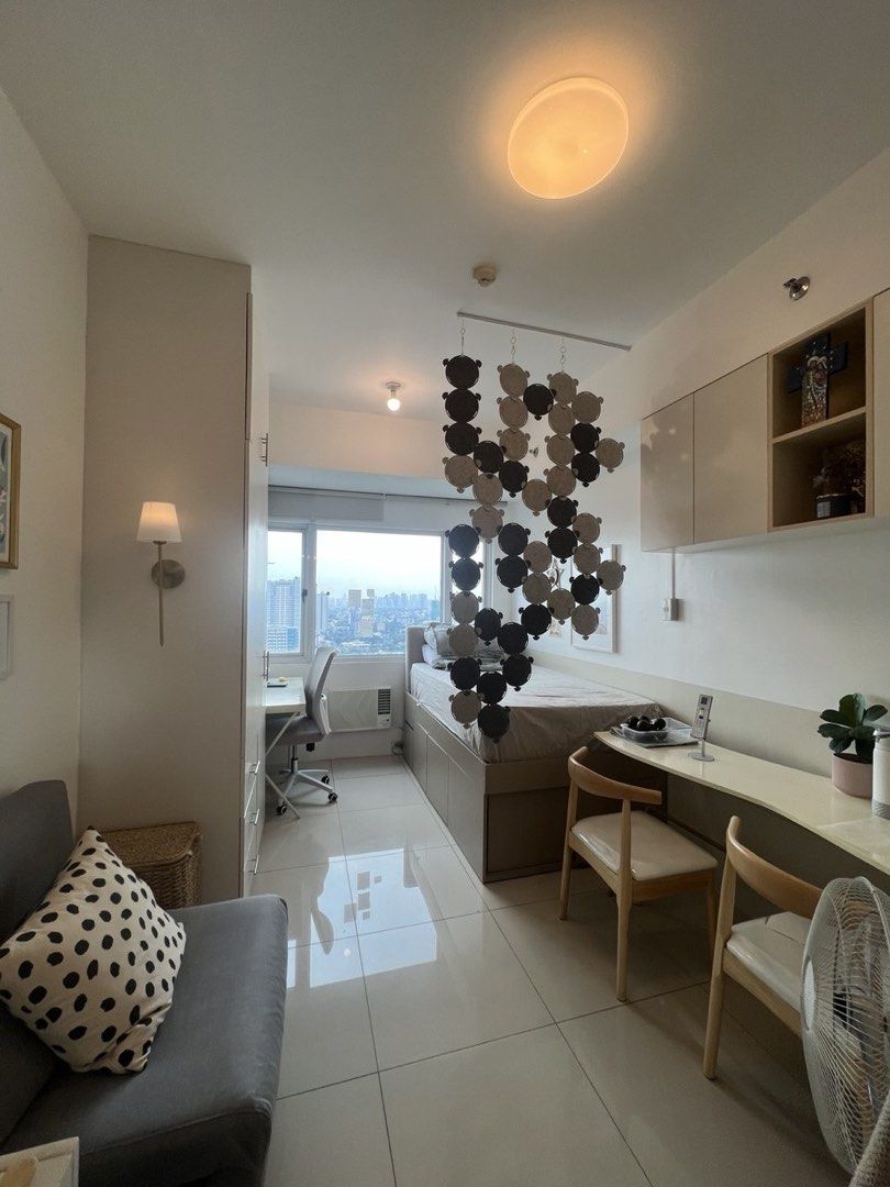 Berkeley Residences Katipunan Condo for rent (Category: Apartments & Condos) located in Quezon City. Submitted by digitalkyra (Listing ID 1466170729, Image 1). Description: Bright and airy condo unit in Berkeley Residences with thoughtfully considered interiors for a student. ☺️ To maximize the space and natural light, this 1-bedroom unit was converted into a studio. ⚡️To save on electricity, the refrigerator is of personal-use size and the air-c