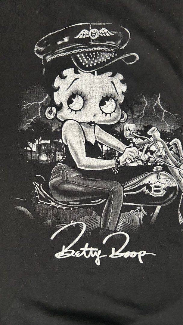 Betty Boop Motorcycle / biker Tee (Category: Tshirts & Polo Shirts ) located in Batangas. Submitted by get.looted (Listing ID 1466219798, Image 2). Description: Betty Boop Motorcycle tee Brisco tag 21x27 M to L fitting.