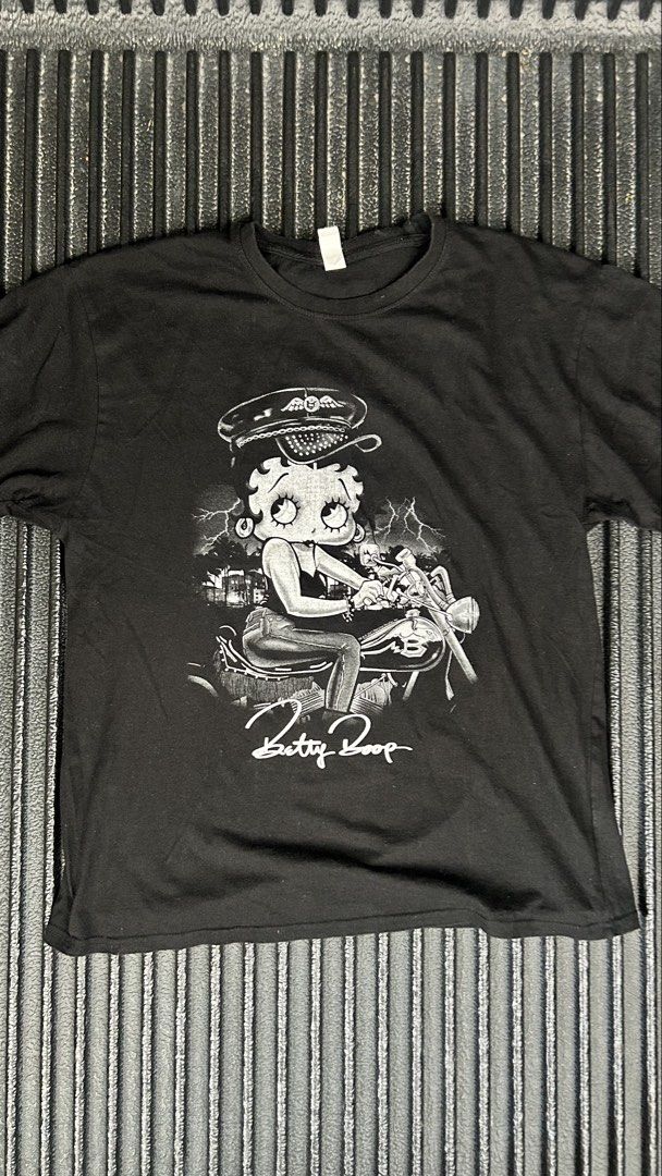 Betty Boop Motorcycle / biker Tee (Category: Tshirts & Polo Shirts ) located in Batangas. Submitted by get.looted (Listing ID 1466219798, Image 1). Description: Betty Boop Motorcycle tee Brisco tag 21x27 M to L fitting.