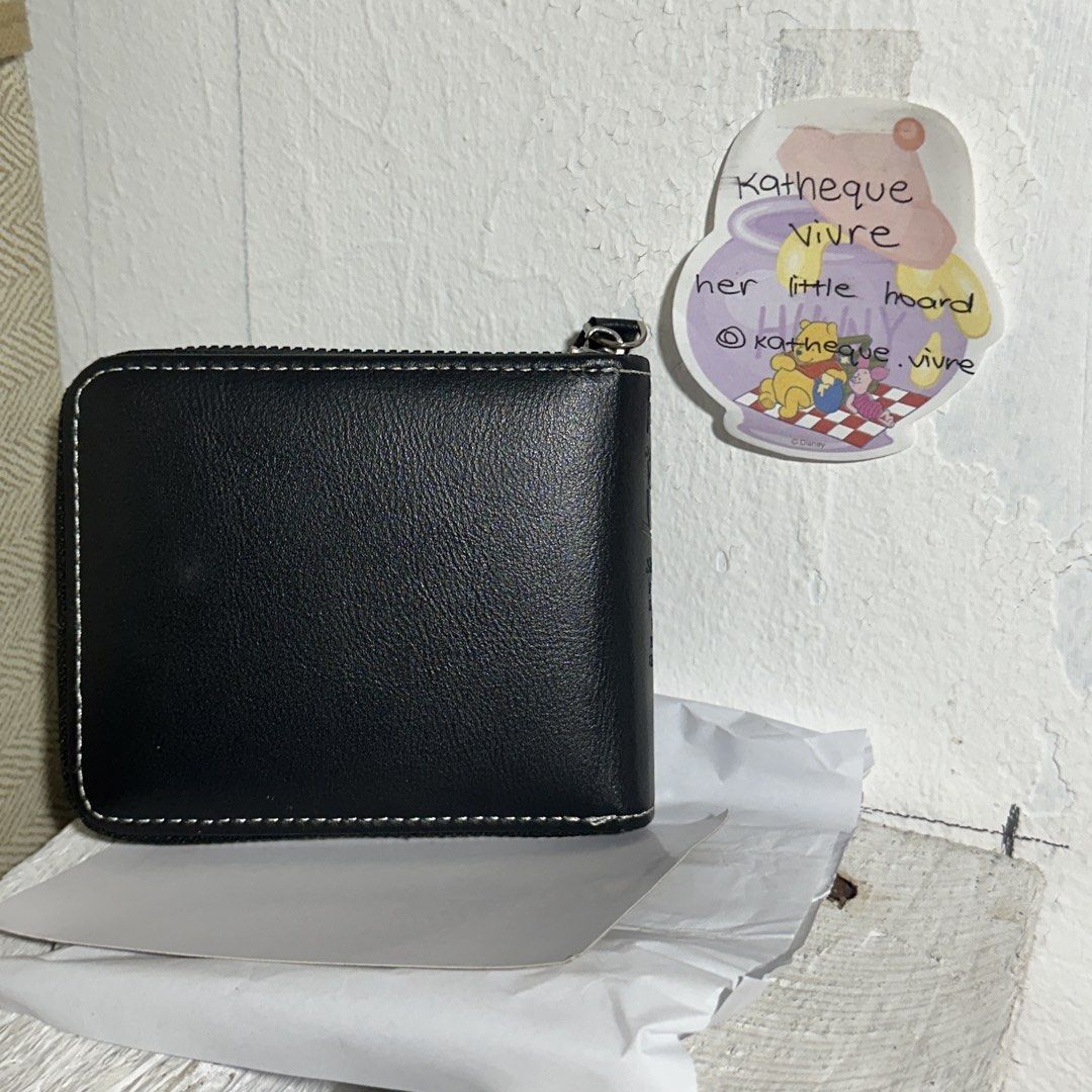 Bevi’s Leather Black Zip-Around Bifold Wallet (Category: Wallets & Card Holders) located in Santa Rosa. Submitted by katheque.vivre (Listing ID 1466265070, Image 2). Description: ─── ☾ ─── ( item details ) ⋆˚✦┈• Bevi’s Leather Black Zip-Around Bifold Wallet ⋆˚✦┈• price: ₱130 ⋆˚✦┈• condition: preloved, well-kept with minor signs of store display/storage ☆ brand: Bevi’s Leather ☆ size: compact / short wallet ♡ features: full zip-around closure, emb