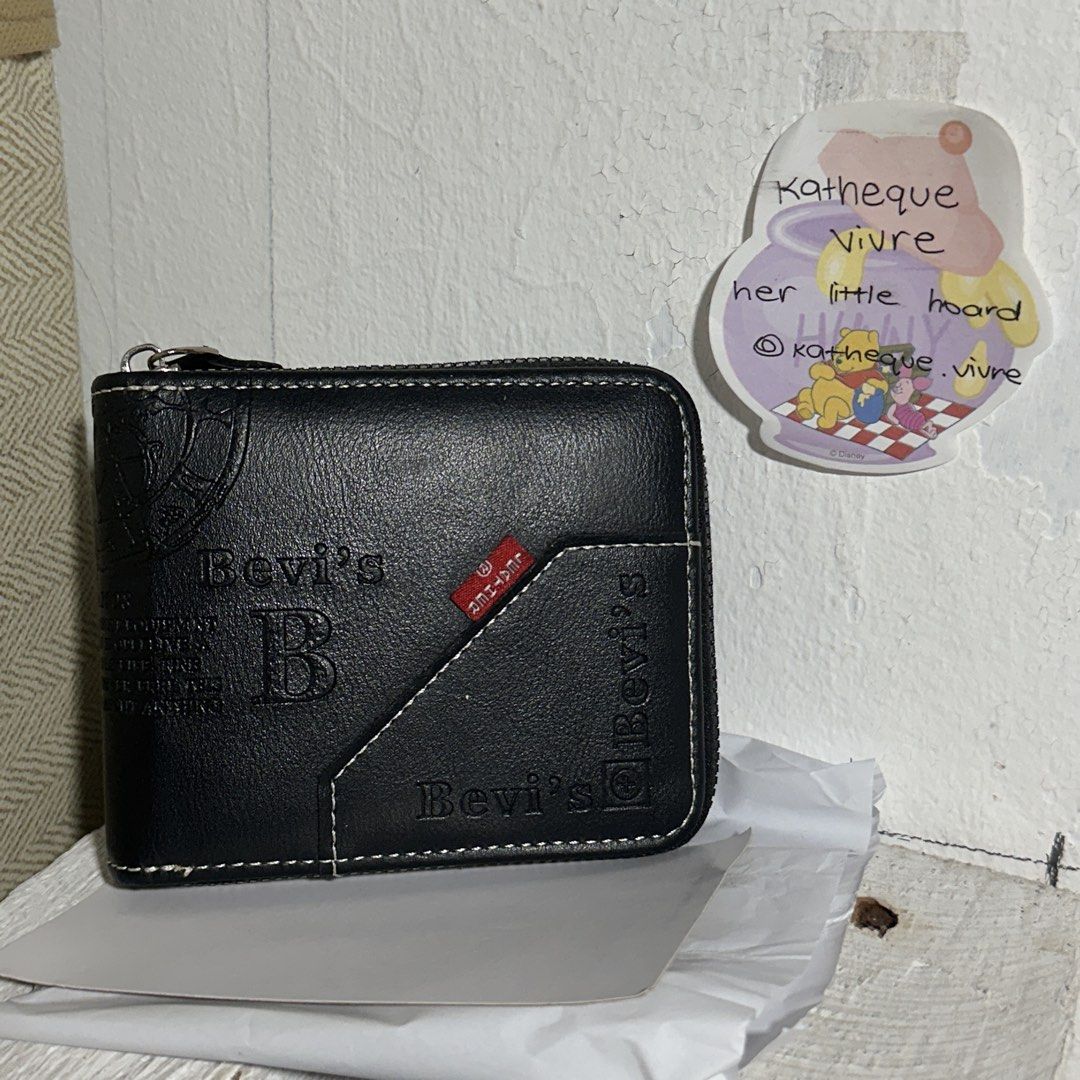 Bevi’s Leather Black Zip-Around Bifold Wallet (Category: Wallets & Card Holders) located in Santa Rosa. Submitted by katheque.vivre (Listing ID 1466265070, Image 1). Description: ─── ☾ ─── ( item details ) ⋆˚✦┈• Bevi’s Leather Black Zip-Around Bifold Wallet ⋆˚✦┈• price: ₱130 ⋆˚✦┈• condition: preloved, well-kept with minor signs of store display/storage ☆ brand: Bevi’s Leather ☆ size: compact / short wallet ♡ features: full zip-around closure, emb