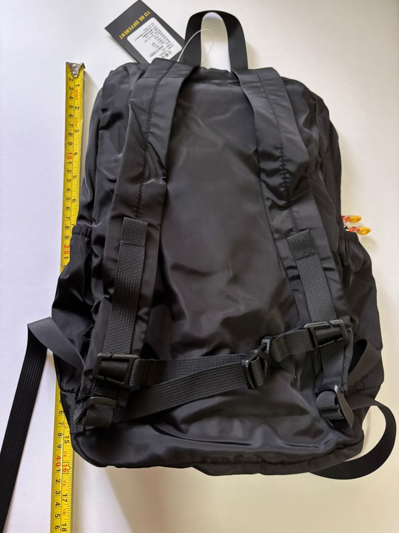 Black Backpack (Category: Backpacks) located in Quezon City. Submitted by leahs.stuff (Listing ID 1466227508, Image 2). Description: - Brand new, unopened, and still in original factory plastic packaging - Features a black design with striking yellow 'TO BE DIFFERENT' text - Factory tag attached for authenticity - Ideal for daily commuting, school, or casual use.