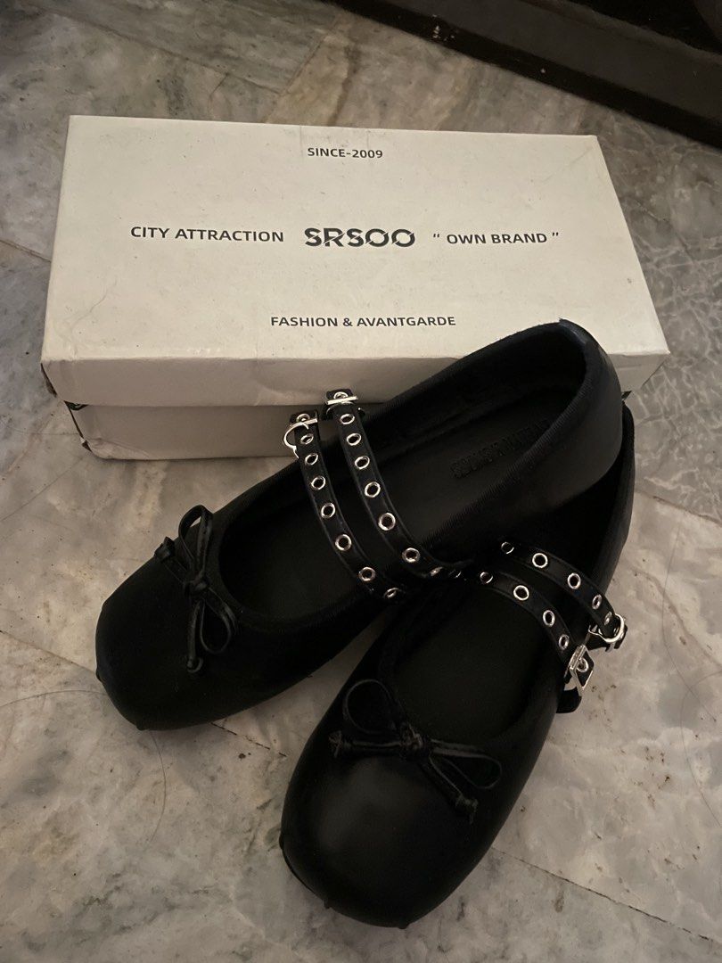 Black Bow Mary Jane Flats with Double Straps (Category: Flats & Sandals) located in Quezon City. Submitted by cinnakitty (Listing ID 1466177508, Image 2). Description: - Style: Black Mary Jane flats with rounded toe and small cute bow - Details: Double buckled straps with metal eyelets - Comfort: Flat soles, easy to slip on and wear all day - Inclusion: Original branded shoebox included - Size: 39, but can fit 38 if wide feet - Condition: used 1-