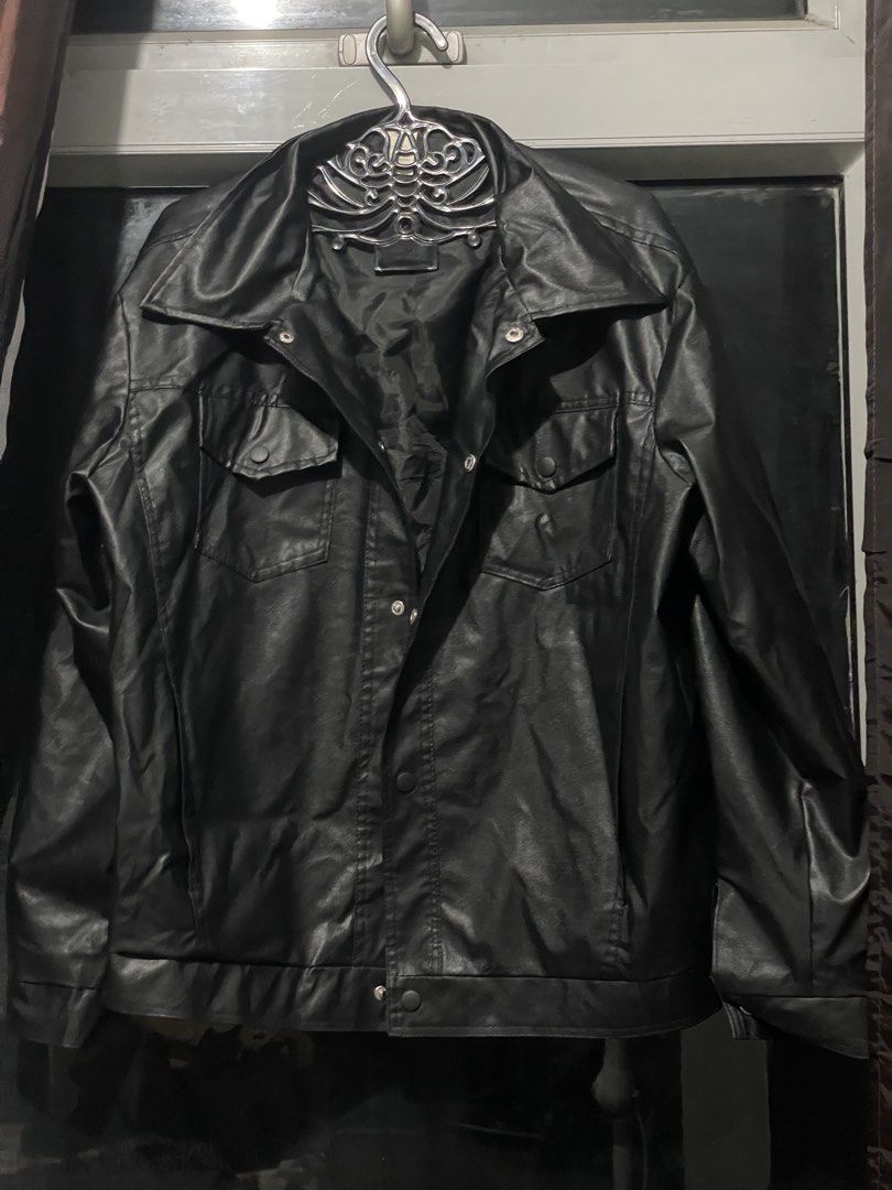 Black Faux Leather Jacket with Pockets (Category: Coats, Jackets and Outerwear) located in Makati City. Submitted by ajuniceuu (Listing ID 1466179678, Image 1). Description: - Color: Black - Material: Faux leather with smooth inner lining - Design: Classic collar, front button closure - Pockets: Two chest pockets with flaps - Fit/Use: Great for layering in cooler weather - Condition: Brand new / Excellent.