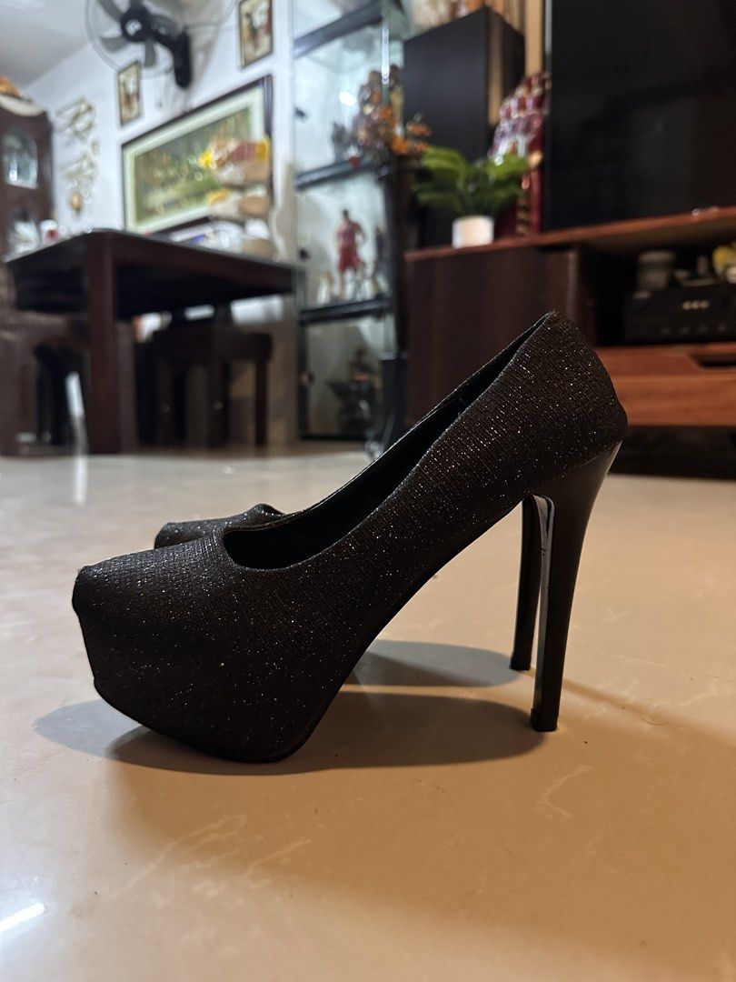 Black Glitter High Heel Platform Pumps Size 38 (Category: Heels) located in Manila. Submitted by mysticdog_8e9243 (Listing ID 1466181281, Image 3). Description: - Style: Slip-on high heels with platform sole and glossy stiletto heel - Color/Finish: Stunning black glitter - Size: 38 (marked on sole) - Condition: Worn a few times, minor signs of use on soles - Perfect for: Parties, events, and glam nights out - RFS: Decluttering closet.
