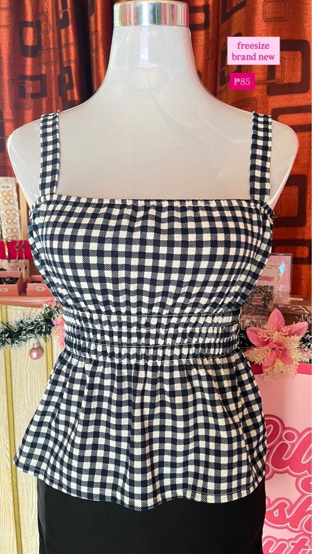 black grid top (Category: Sleeveless) located in Manila. Submitted by myapparelshop (Listing ID 1466170270, Image 1). Description: .