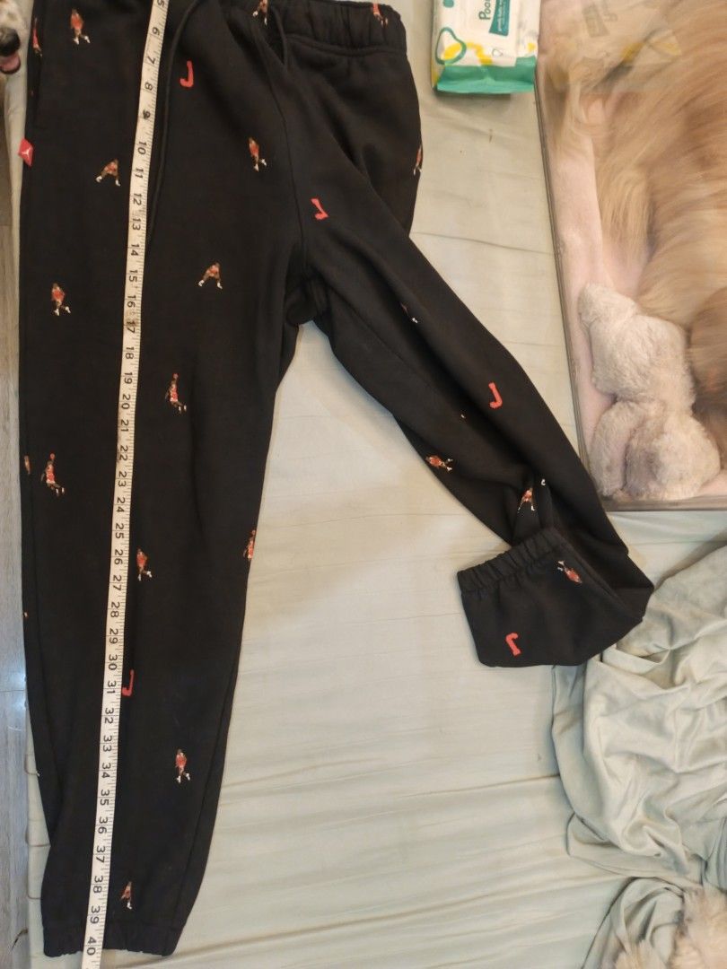 Black Jordan Pants with Red Jumpman Logo (Category: Joggers) located in Caloocan City. Submitted by mightyocean.04c3c0 (Listing ID 1460975710, Image 3). Description: - Black Jordan sweatpants - Features repeating red Jumpman logo and 'J' graphic all over - Elastic waistband with drawstring for a comfortable fit - Ideal for casual wear - A must-have for any Jordan fan ****Rare All Over Print Jordan Jogger..still nego..pls DM me🥰 M on tag but can 